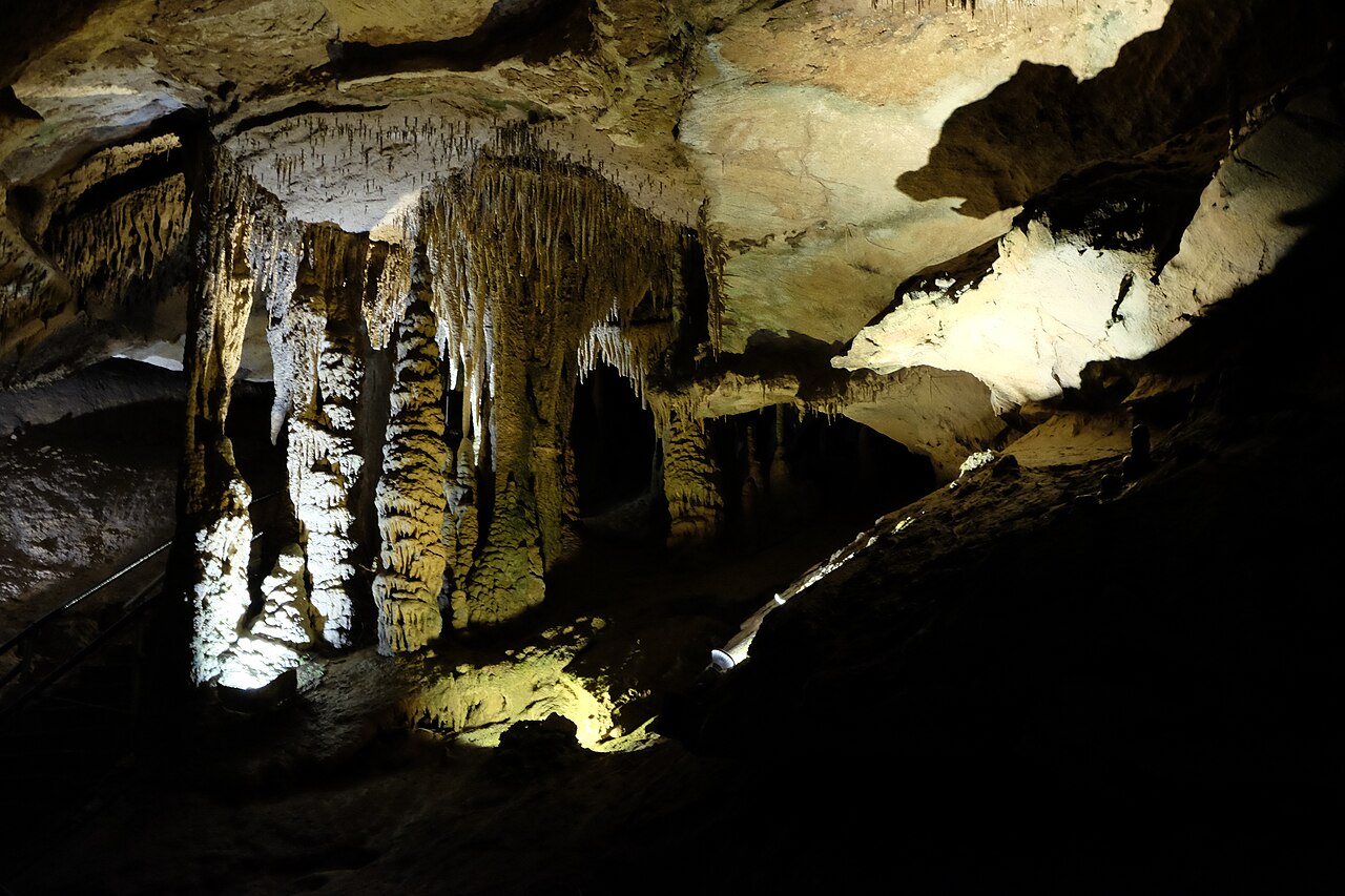 Lit cave formations inside Tuckaleechee Caverns in Townsend, Tennessee
